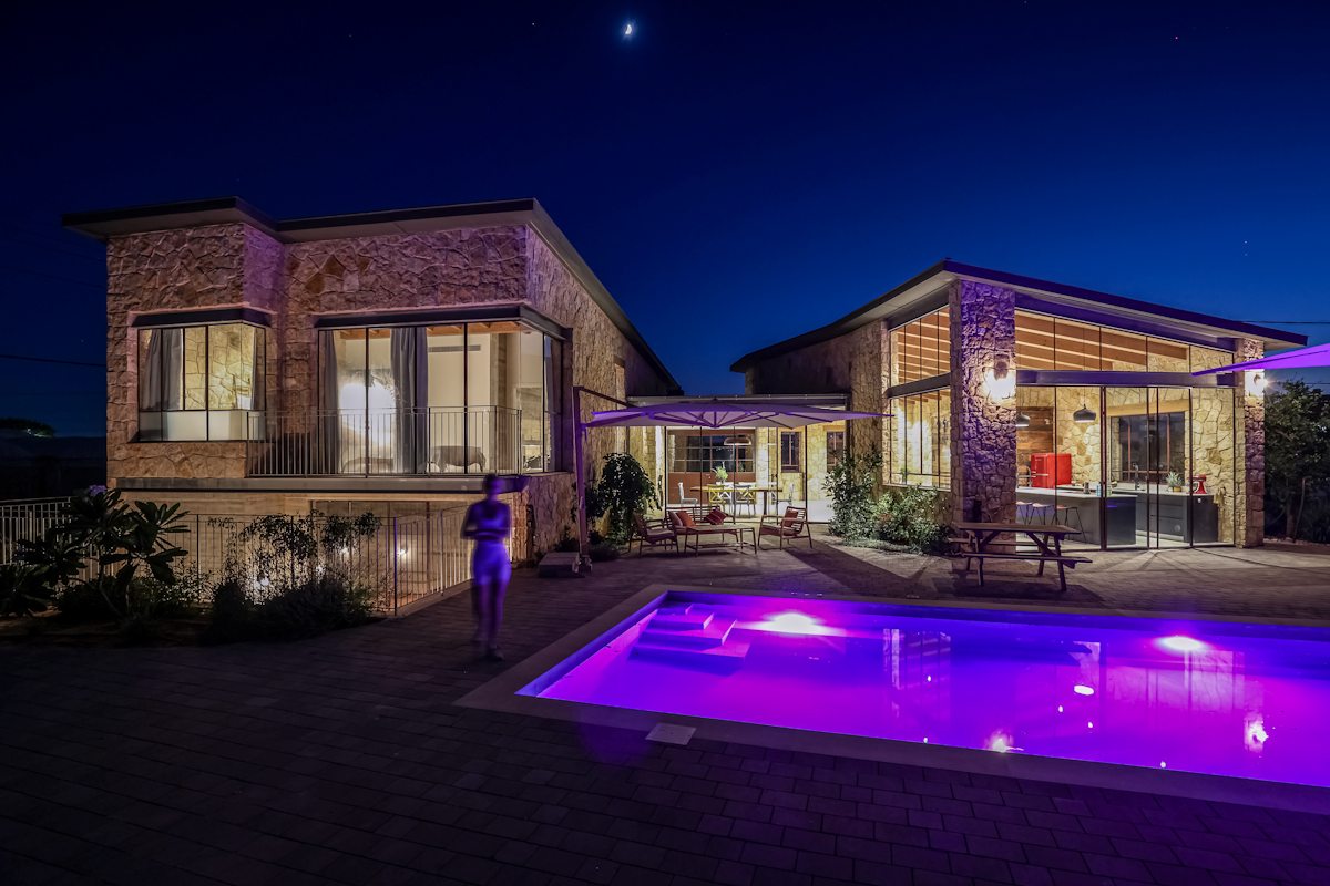 Ringwood timber frame roof project casa de pietra exterior night direct view